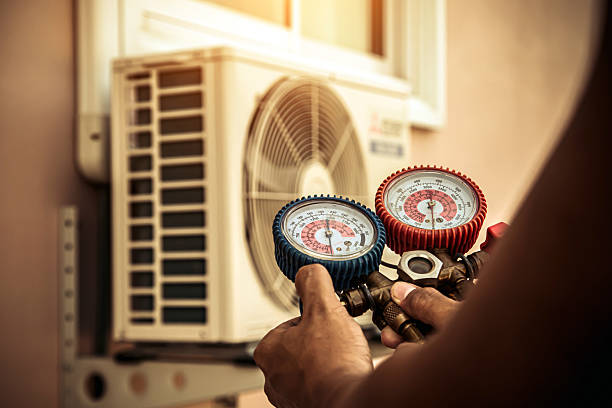 Professional Hvac technician working in Howes Cave, NY